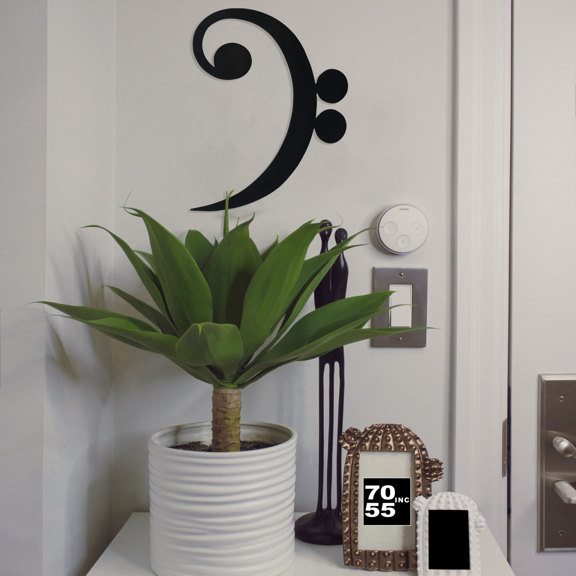 hammered-black-bass-clef-by-door-scaled