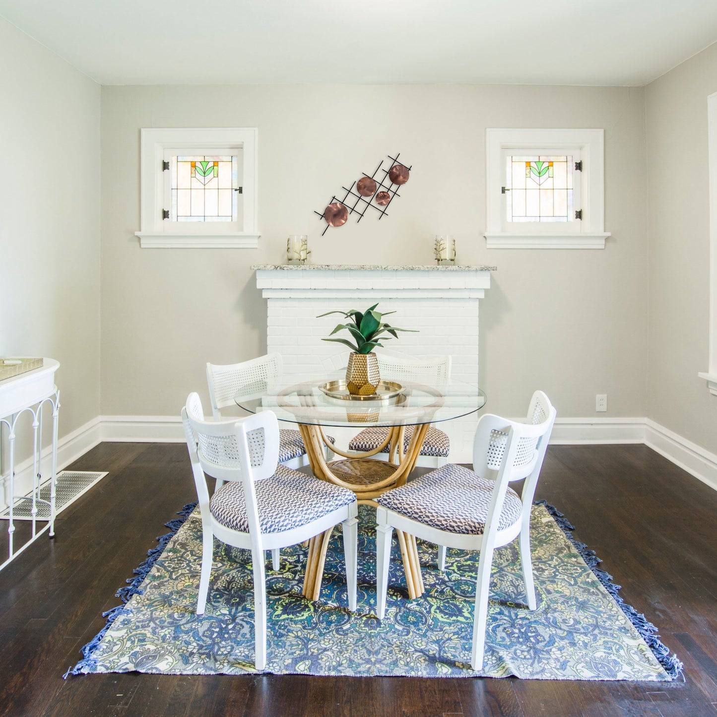 polished-copper-Satellite-Circles-over-Fireplace-scaled